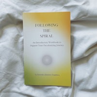 the book following the spiral on a bed